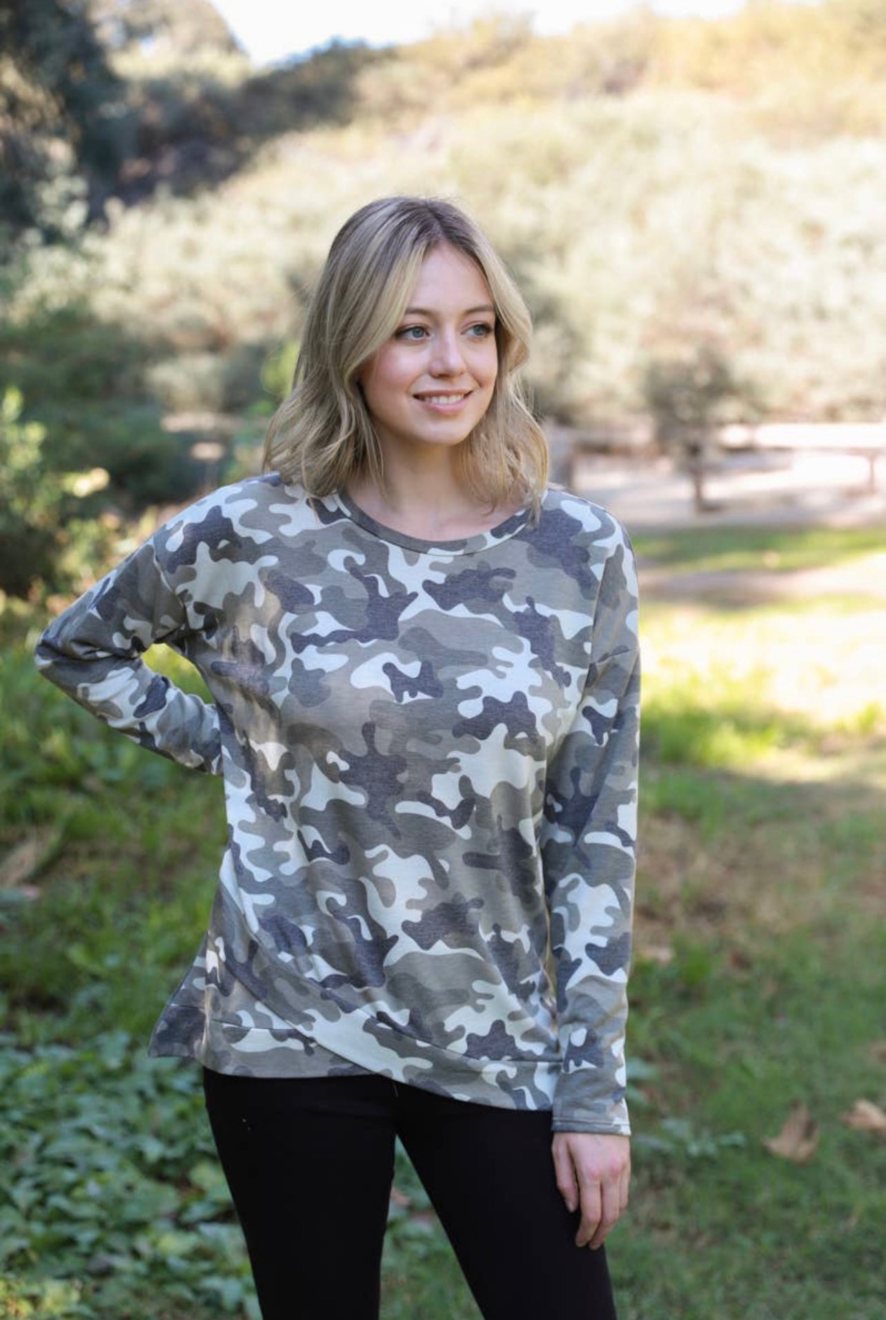 Camo faux wrap knit top